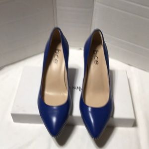 bce pointy heels with silver tone studs. NWOT